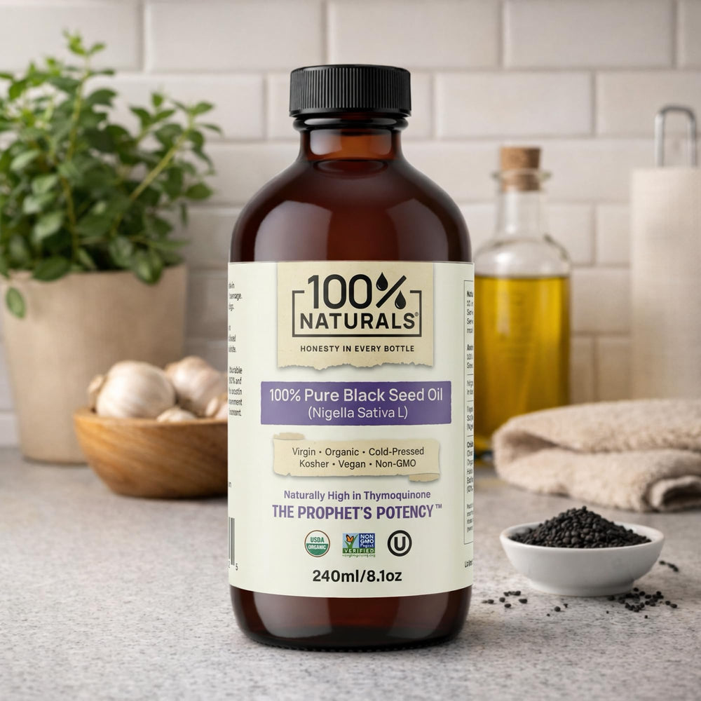 100% Naturals Black Seed Oil is poured for daily wellness use.