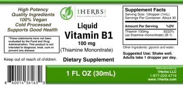 Close-up of 1Herbs Thiamine liquid bottle showing a clean, alcohol-free formula.