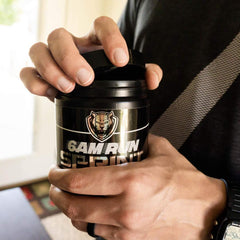 6AM Run Lemonade sports bottle in use during a run.
