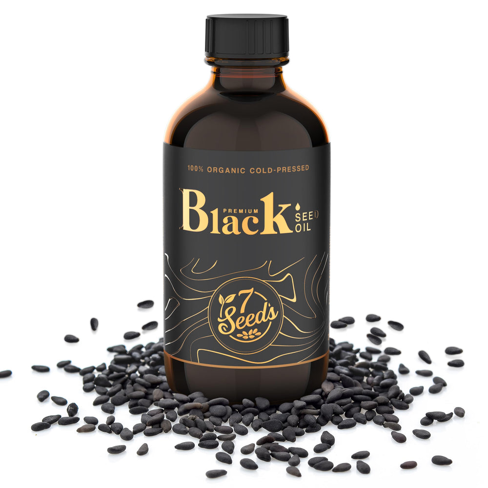 7 Seeds Black Seed Oil amber bottle closeup highlights premium cold-pressed origin
