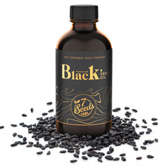 7 Seeds Black Seed Oil amber bottle closeup highlights premium cold-pressed origin
