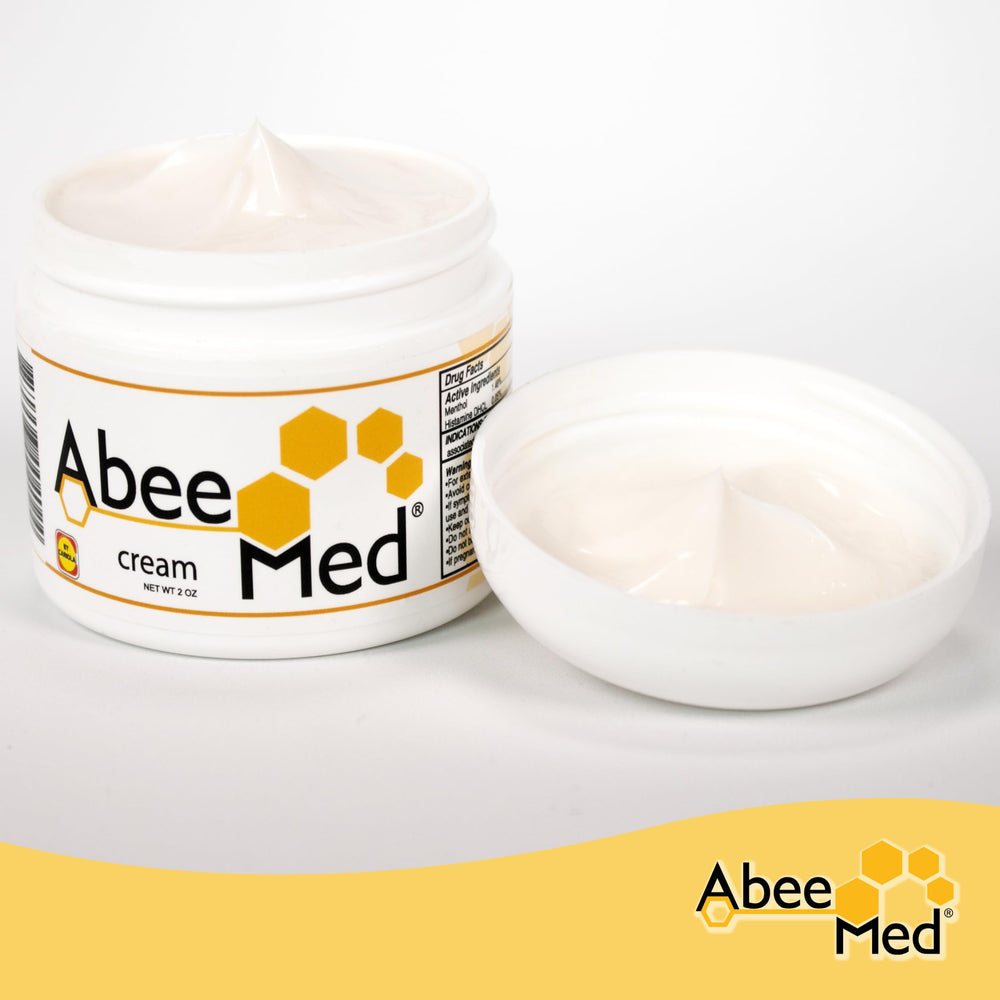 ABEE MED massage-ready cream in hand demonstrates easy rubbing in.