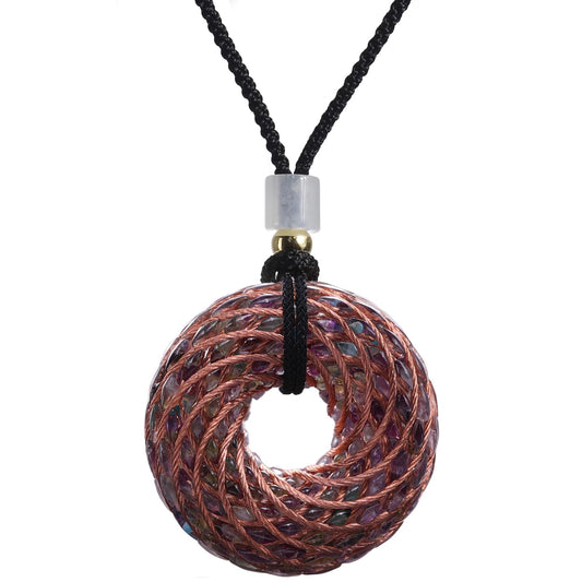 Abrakadoubra Tensor Rings copper pendant with double vortex spiral for balanced energy during daily rituals.