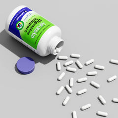 AbsorbAid bottle on counter beside meals for efficient digestion.