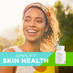 Bottle on vanity displaying daily wellness routine for healthier-looking hair and nails.