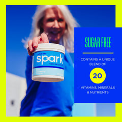 AdvoCare Spark glass with water shows a refreshing low-sugar energy option.