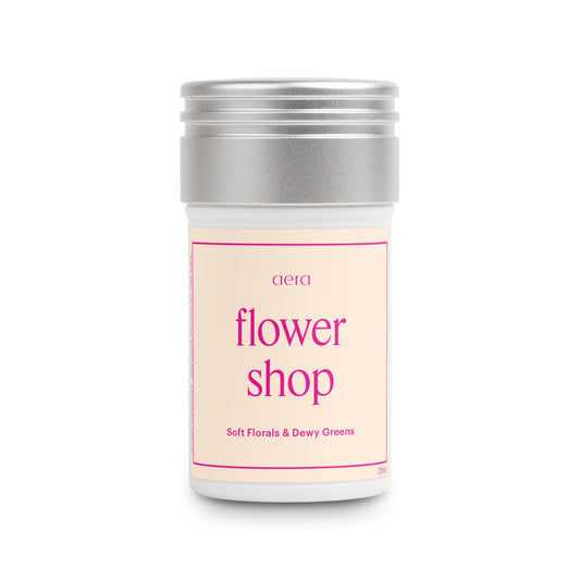 AERA Flower Shop bottle with rose and water lily for a fresh home scent.