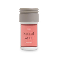 AERA Mini Sandalwood bottle front invites a calming home aroma