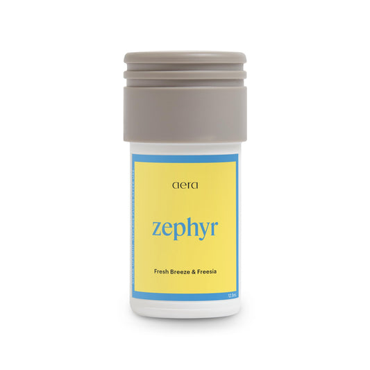 AERA Mini Zephyr bottle cap showcases sustainable design for a clean home fragrance.