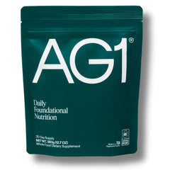 AG1 greens powder refill pouch open showing convenient daily nutrition on the go.