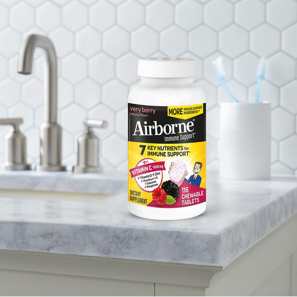 Airborne packaging and bottle; clearly labeled vitamins and minerals for daily use.