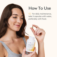 Citrus slices beside capsules suggesting vitamin C content for immune support