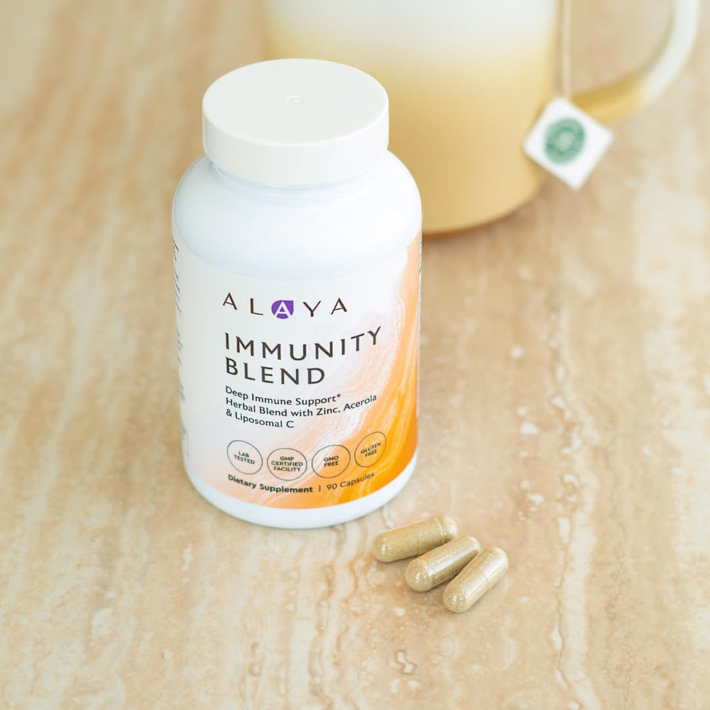 Ingredients scene with Moringa, Elderberry, and Ginger visuals near the bottle