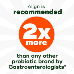 Dispensing jar of Align DualBiotic Gummies on kitchen counter, convenient daily probiotic.
