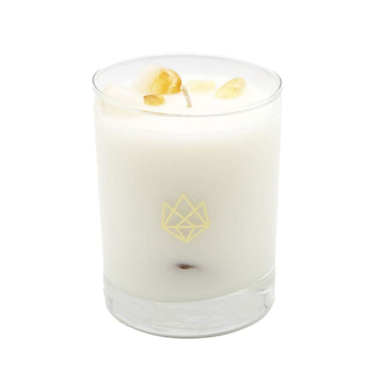 Aluminate Life Citrine-infused candle in glass jar for focused creativity and ambiance.