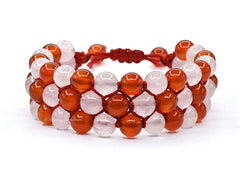 Amazing Gemstone bracelet closeup with rose quartz and carnelian beads for love energy