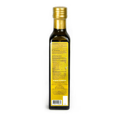 Amazon Andes Sacha Inchi Oil amber glass closeup highlighting light protection.