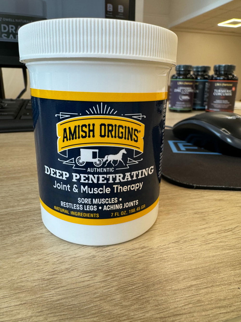 Amish Origins ointment close-up shows thick, rich texture for lasting comfort.