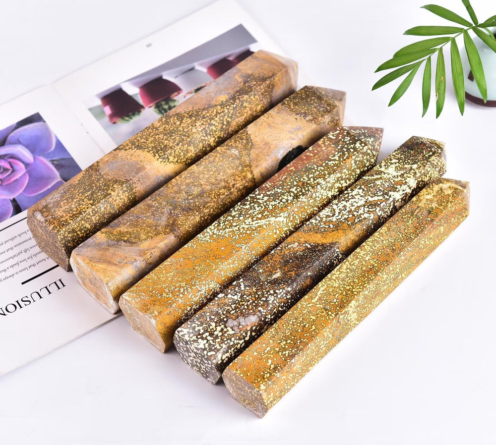 AMOYSTONE ocean jasper wand shown in a calm meditation space.