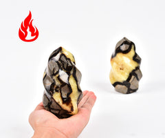 AMOYSTONE Septarian Flame Tower sunlit display showcases warm hues perfect for desk décor