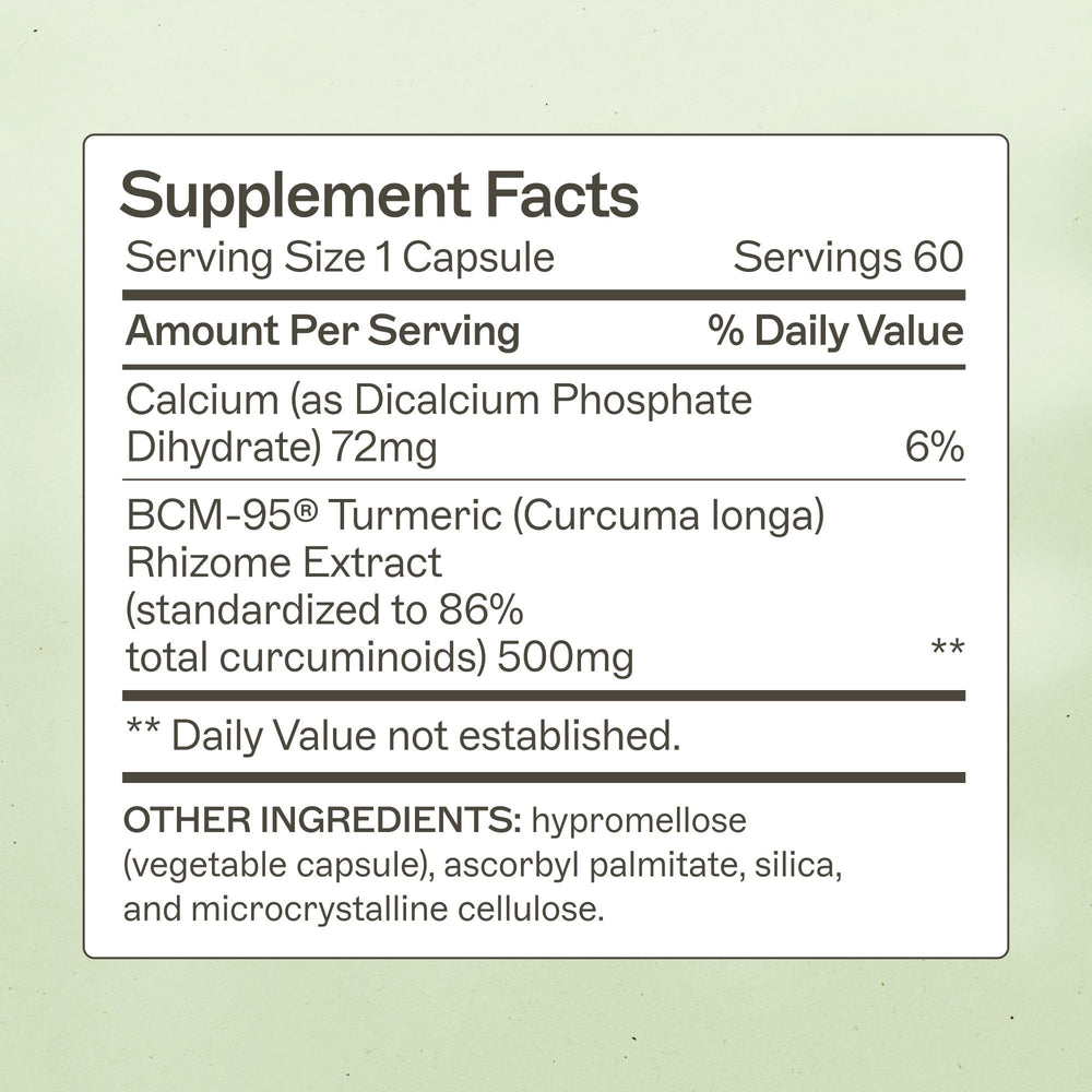 Close-up of capsules emphasizing BCM-95 turmeric for enhanced absorption and gut health.