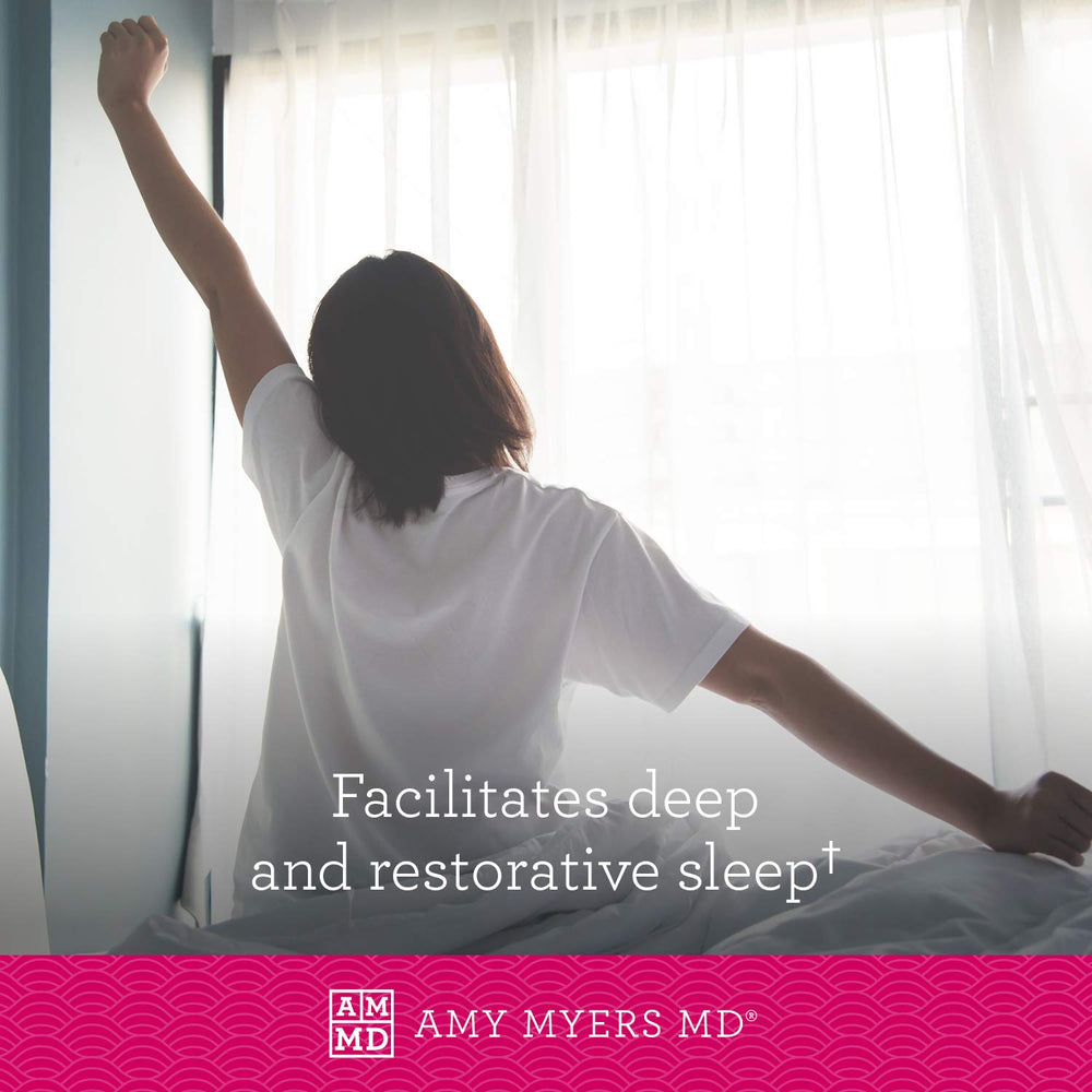 Amy Myers MD Rest and Restore bottle with glass of water for nightly use.