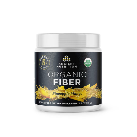 Ancient Nutrition Organic Fiber Powder pineapple mango bottle pour illustrates convenient serving.