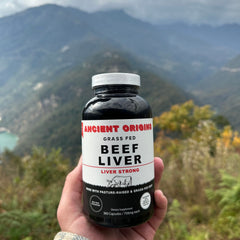 Ancient Origins daily-serving setup with beef liver capsules ready for use.
