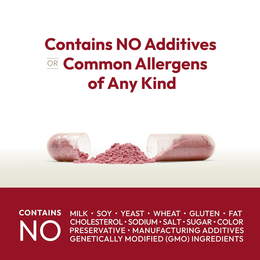 Capsules in hand from Andrew Lessman Cranberry, suggesting a simple daily wellness habit.