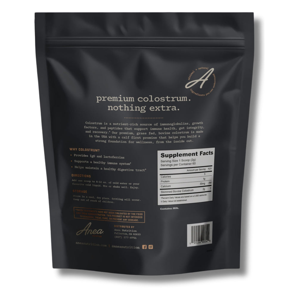 Anea Nutrition Colostrum Unflavored scoop ready for easy daily dosing.