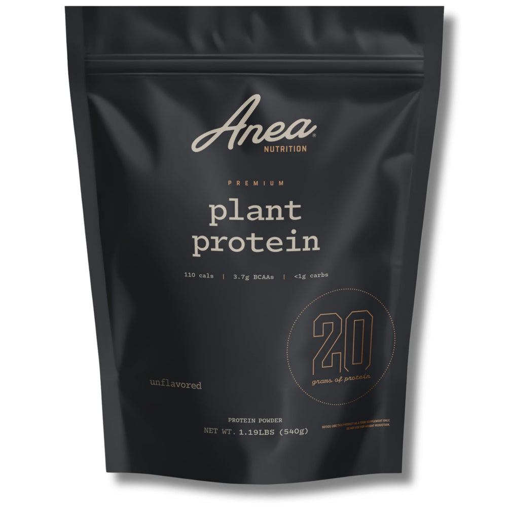 Anea Plant Protein unflavored tub, a neutral vegan protein base for smoothies.