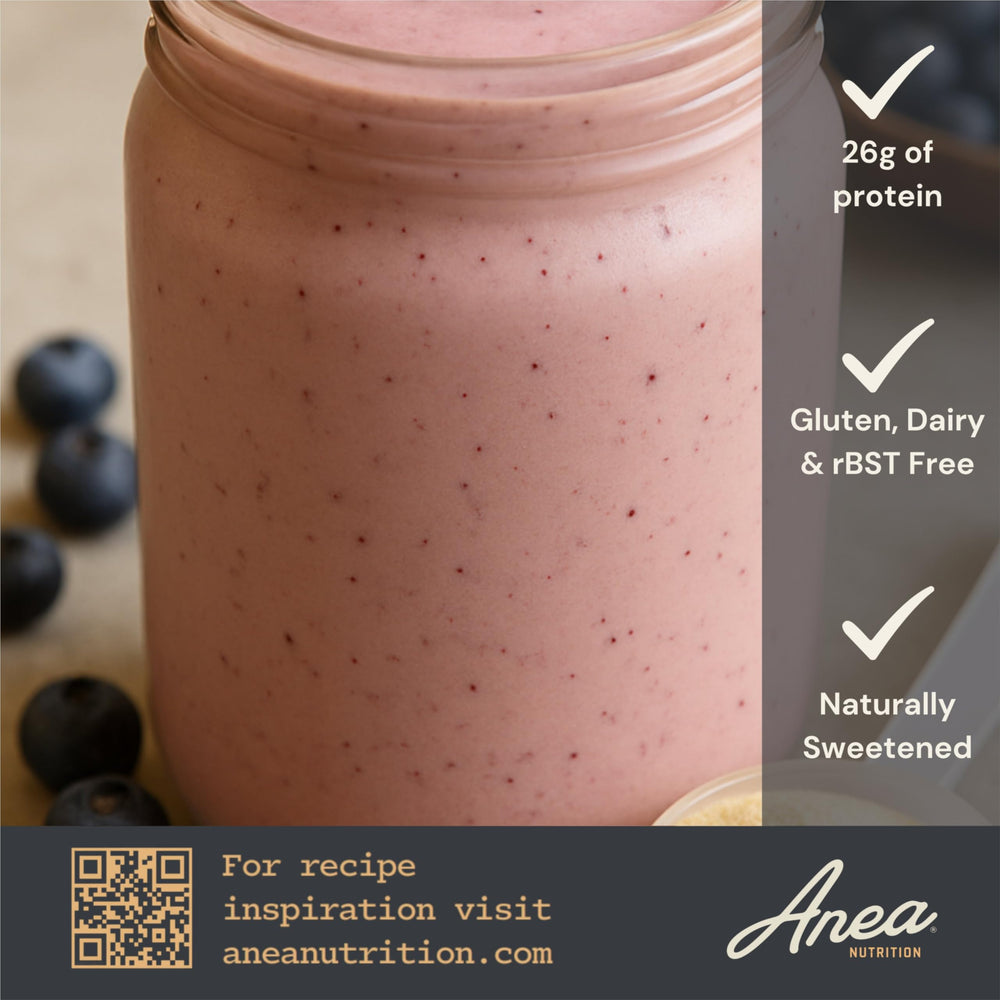 Glass with ice and vanilla protein shake, ideal after training.