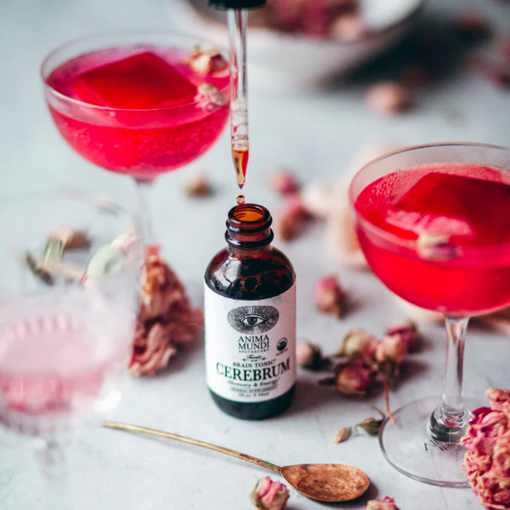 Anima Mundi Cerebrum ingredients herbs in bowl; sustainably sourced botanicals.