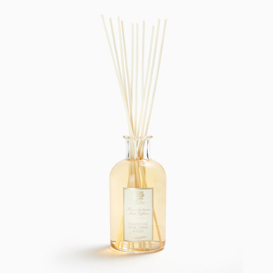 Antica Farmacista damascena rose diffuser bottle enhances luxurious home ambience.