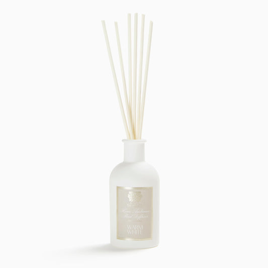 Antica Farmacista warm white diffuser bottle for cozy spaces with lasting fragrance.