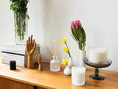 APOTHEKE Reusable glass vessel candle supports sustainable decor.