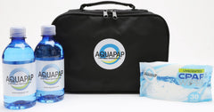 Aquapap 12-pack display shows long-haul supply.