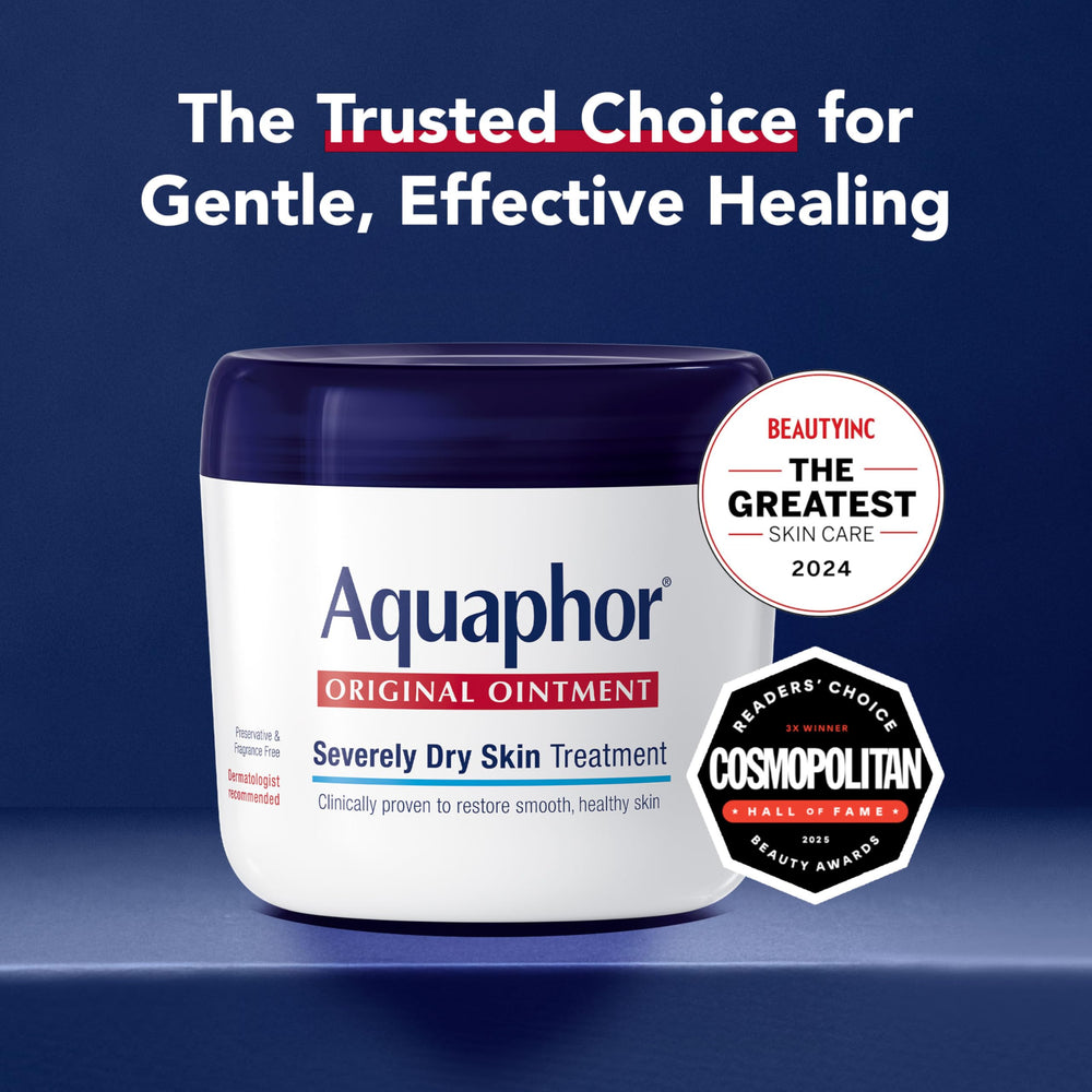 Applying Aquaphor Healing Ointment to hands for dry skin relief.