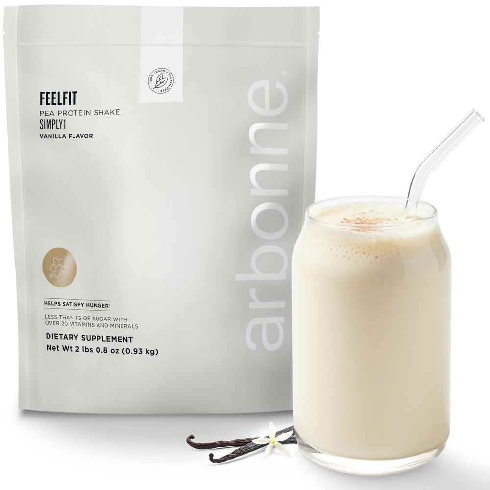 Arbonne FeelFit vanilla pea protein tub, ideal base for smoothies with plant-based nutrition.