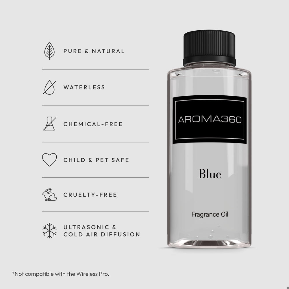 Aroma360 Blue diffuser oil closeup shows elegant amber color and premium blend.