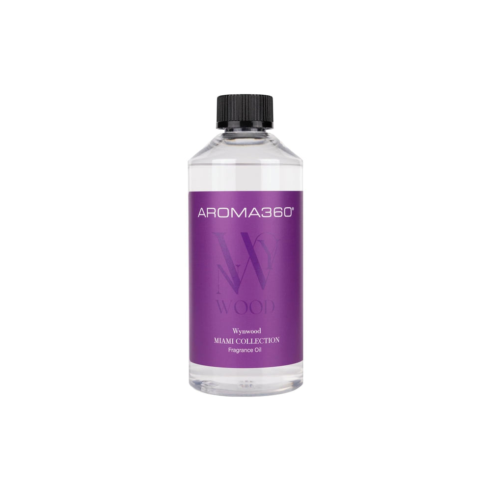Aroma360 Wynwood fragrance oil bottle shows pink grapefruit, armoise, white patchouli for a luxurious home scent
