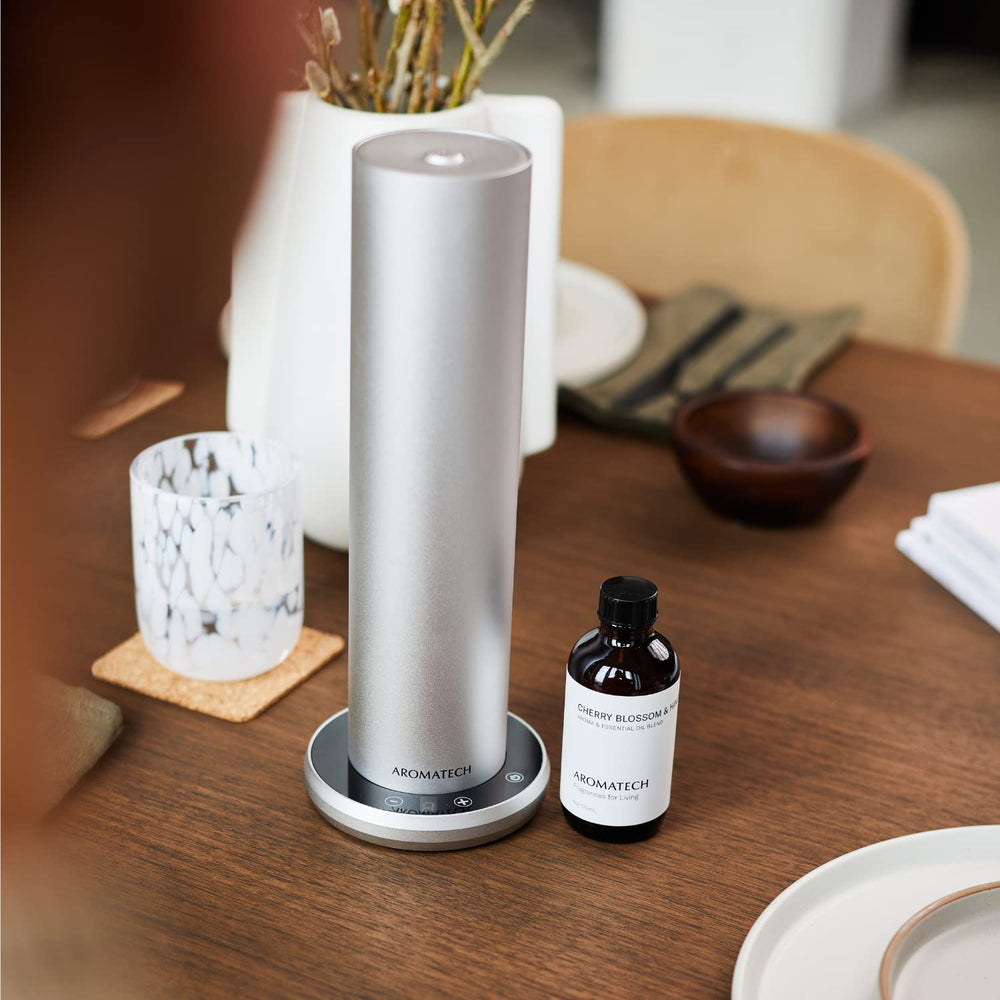AromaTech Cherry Blossom Hinoki oil pour showing easy application