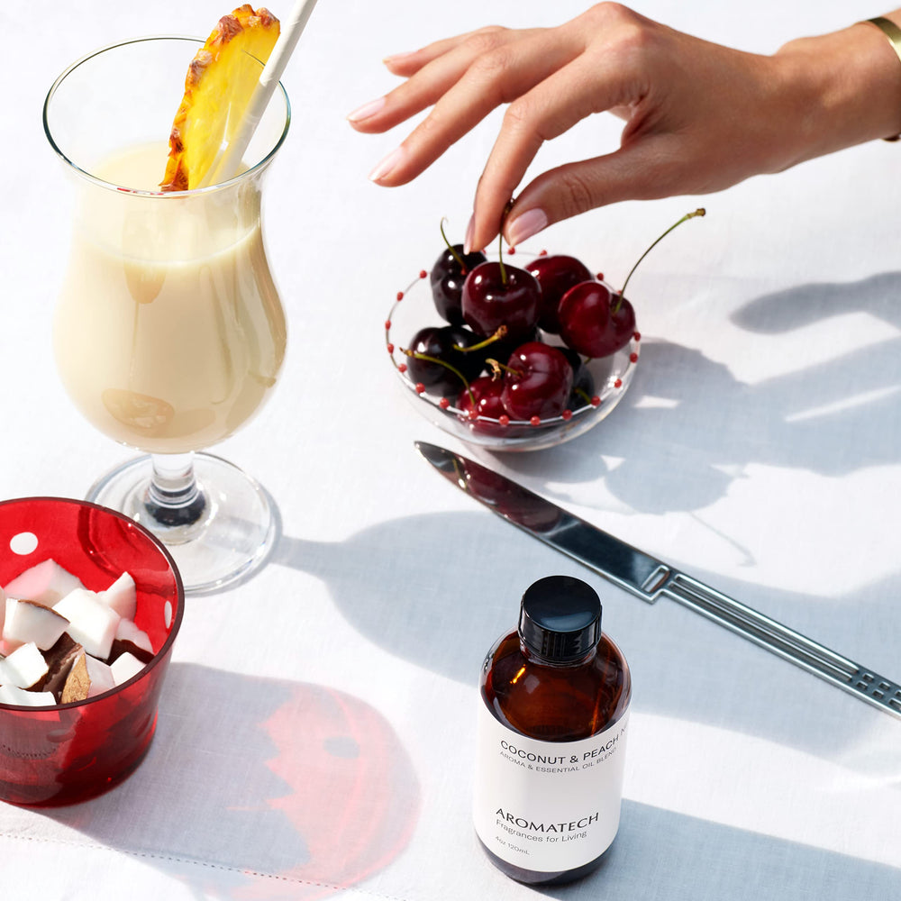 Lifestyle scene featuring Aromatech Coconut & Peach Nectar in a hotel-inspired room
