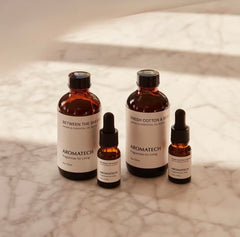 Drops of Aromatech Fresh Cotton & Bergamot ready for diffuser use.