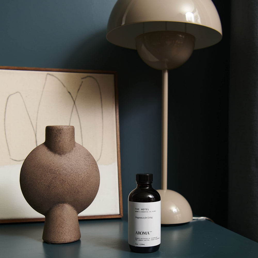 AromaTech Red Rose Pine diffuser oil bottle with classic, cozy aroma.