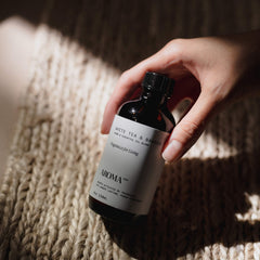 In-room scene with AromaTech White Tea & Bamboo for a fresh, cozy mood.
