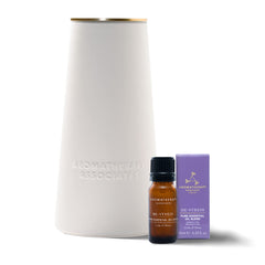 Aromatherapy Associates atomizer in use releasing a calming mist for focus