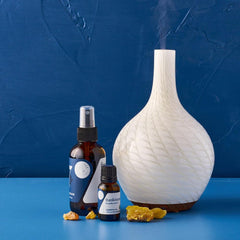 Meditation setup with frankincense oil supporting mindful breathing.