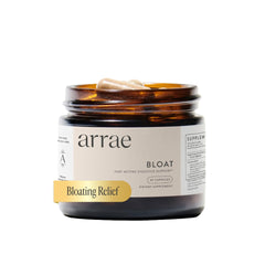 Arrae Bloat capsules bottle close-up for fast relief after meals.