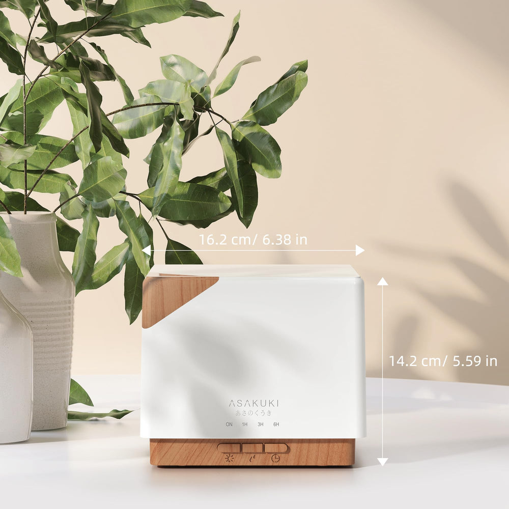 ASAKUKI diffuser displaying vibrant LED colors for mood lighting and focus.